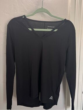 Reebok Women’s Black Long-Sleeve V-Neck Top with Subtle Logo